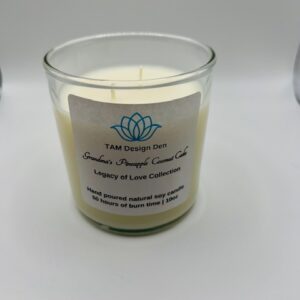 A scented candle in a glass container labeled "Lotus Flower" with relaxation benefits.